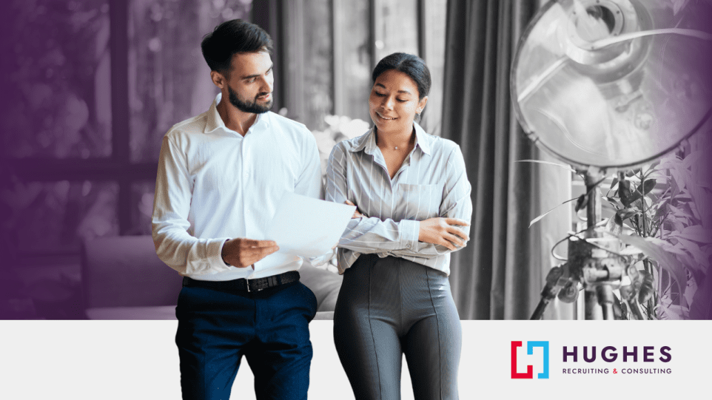 Two candidates discussing a paper to prepare for a job interview